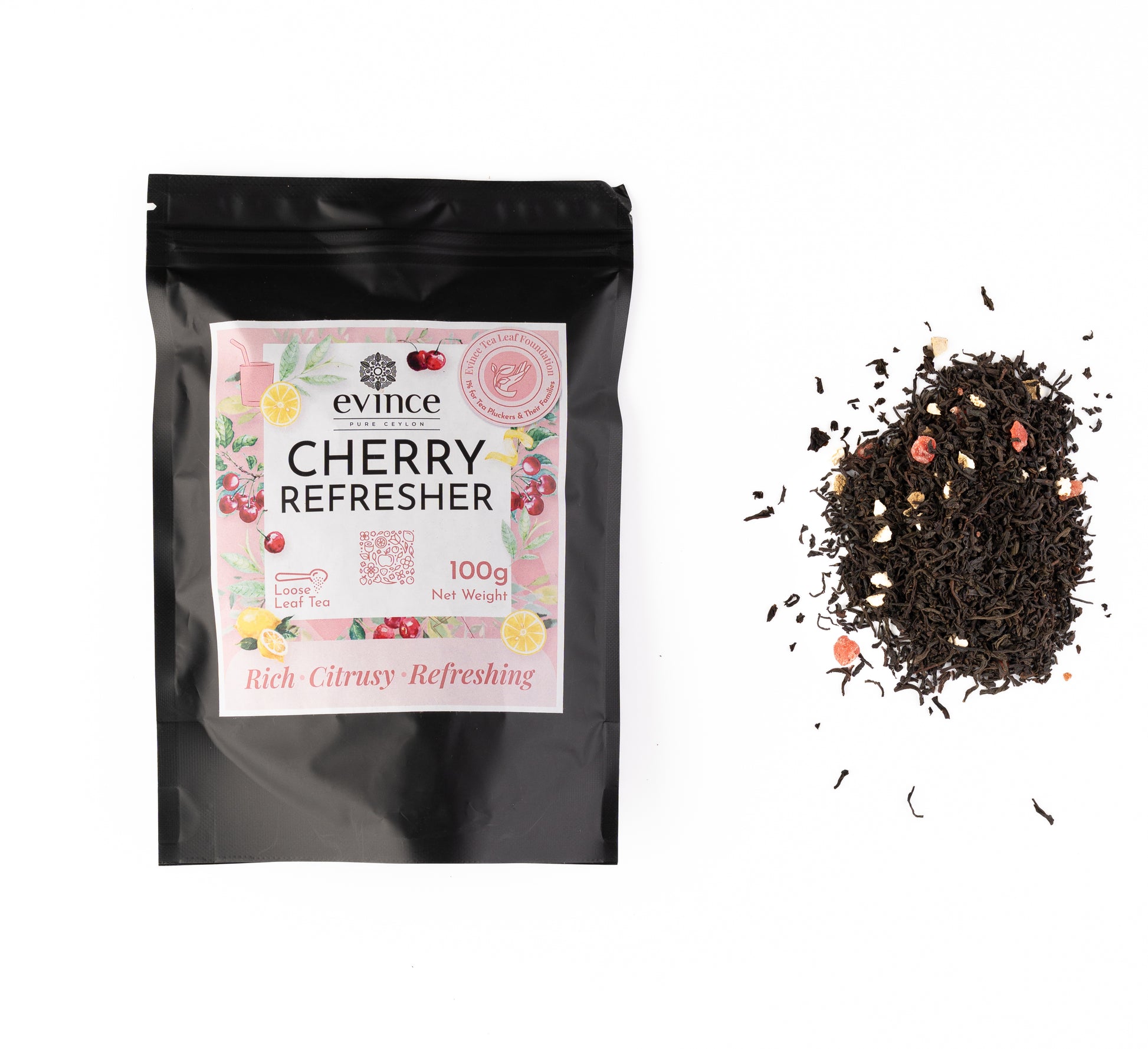 cherry refresher tea with loose leaf blend, cherry cubes with its pack on a white background