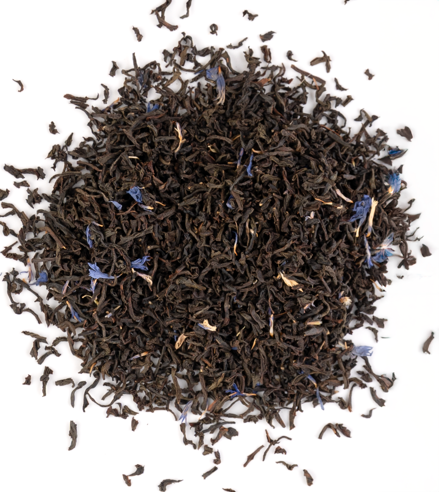 Earl Grey tea with bergamot citrus slice, loose black tea leaves on a white background