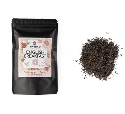 English Breakfast tea with loose leaf blend and its pack on a white background