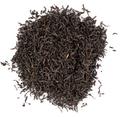 English Breakfast tea with loose leaf blend on a white background