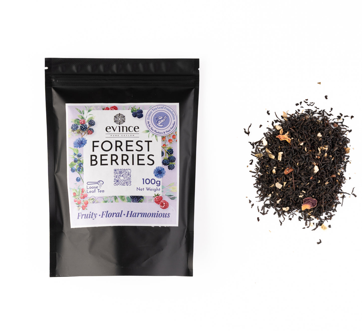 Vibrant berry-infused tea with hibiscus, elderberries, and rosehips with its pack on a white background