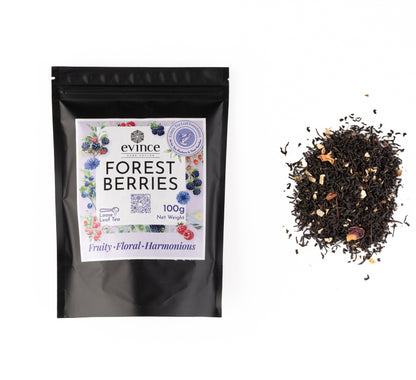 Vibrant berry-infused tea with hibiscus, elderberries, and rosehips with its pack on a white background