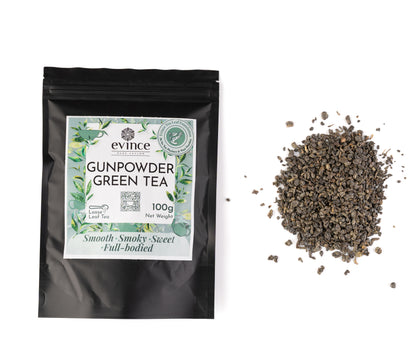 Rolled Ceylon Gunpowder green tea leaves and its pack on a white backgrund