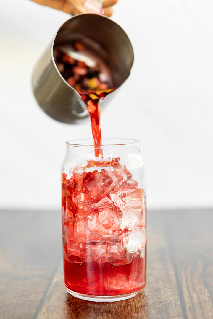 A closeup image of an iced tea being prepared