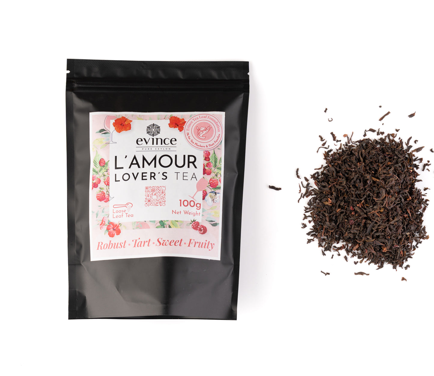Romantic herbal tea blend with rose petals, hibiscus, and Ceylon green tea with its pack on a white background