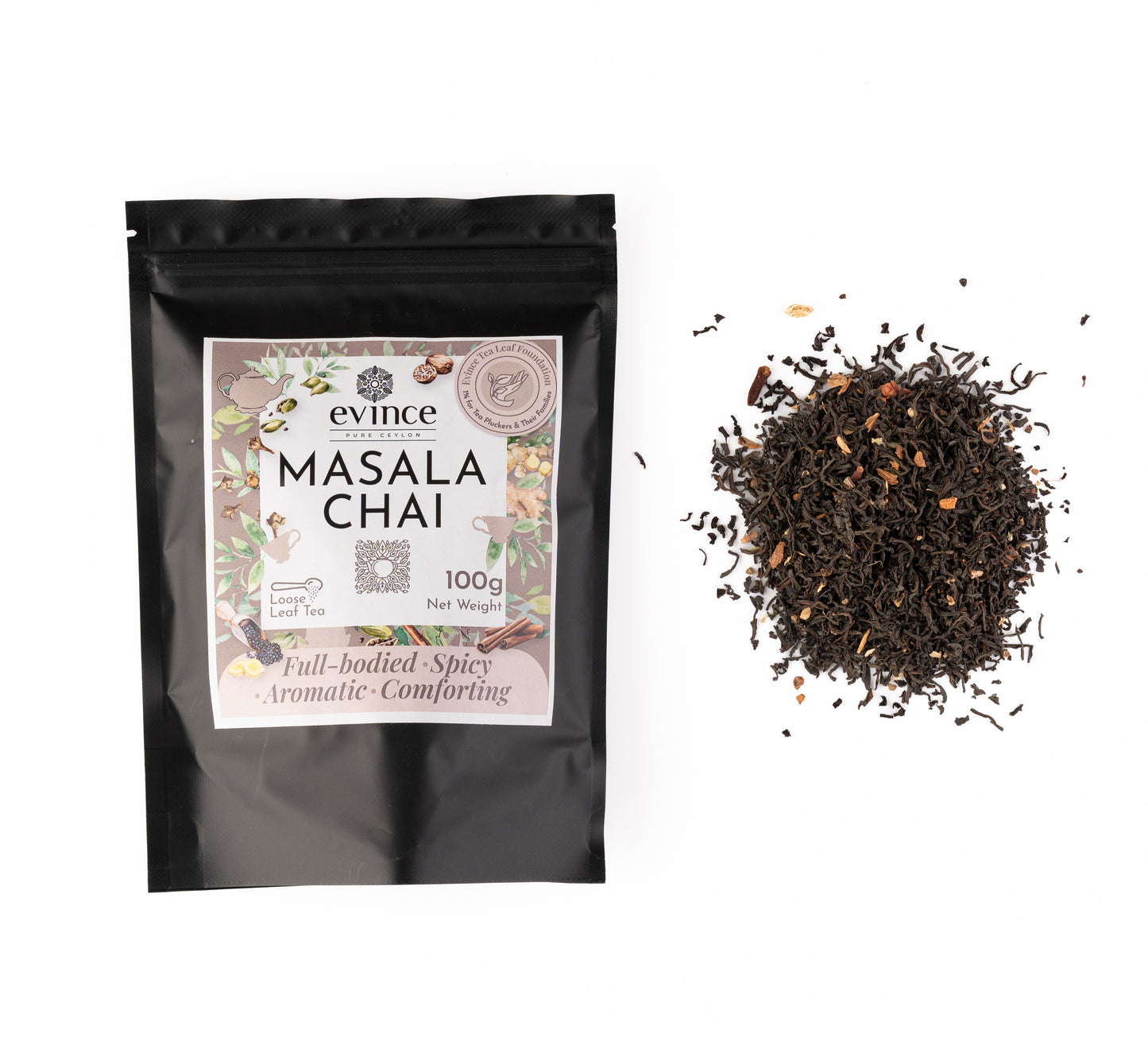 Aromatic Ceylon black tea with whole spices like cinnamon, cardamom, and cloves with its pack on a white background