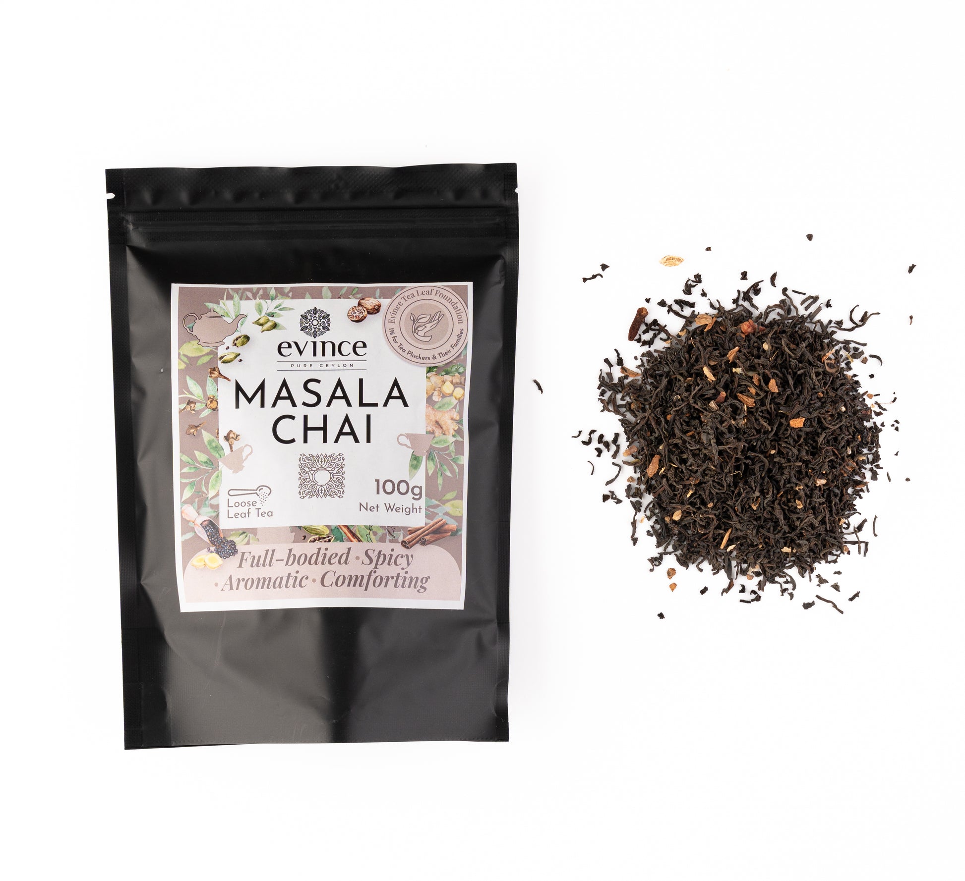 Aromatic Ceylon black tea with whole spices like cinnamon, cardamom, and cloves with its pack on a white background