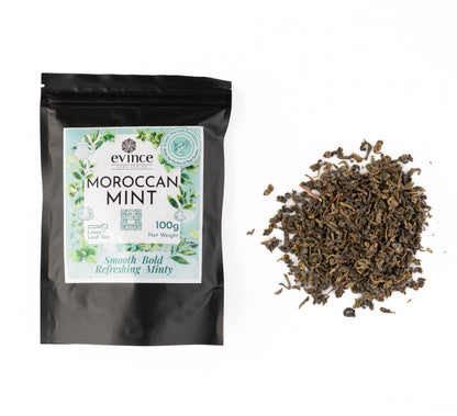 Loose leaf green tea blended with fresh mint leaves and its pack on a white bakground