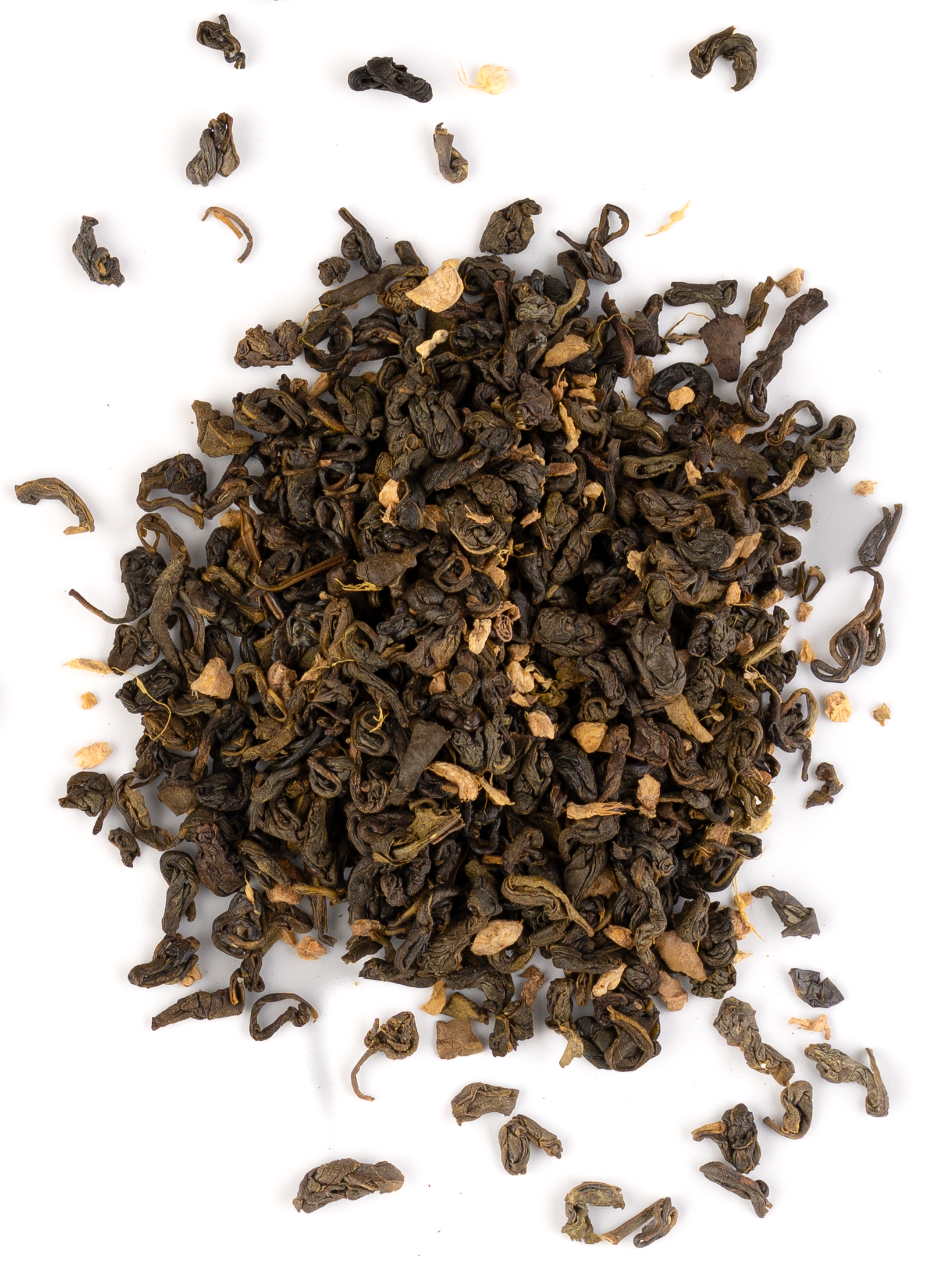 Loose leaf green tea with visible ginger and spice pieces on a white background