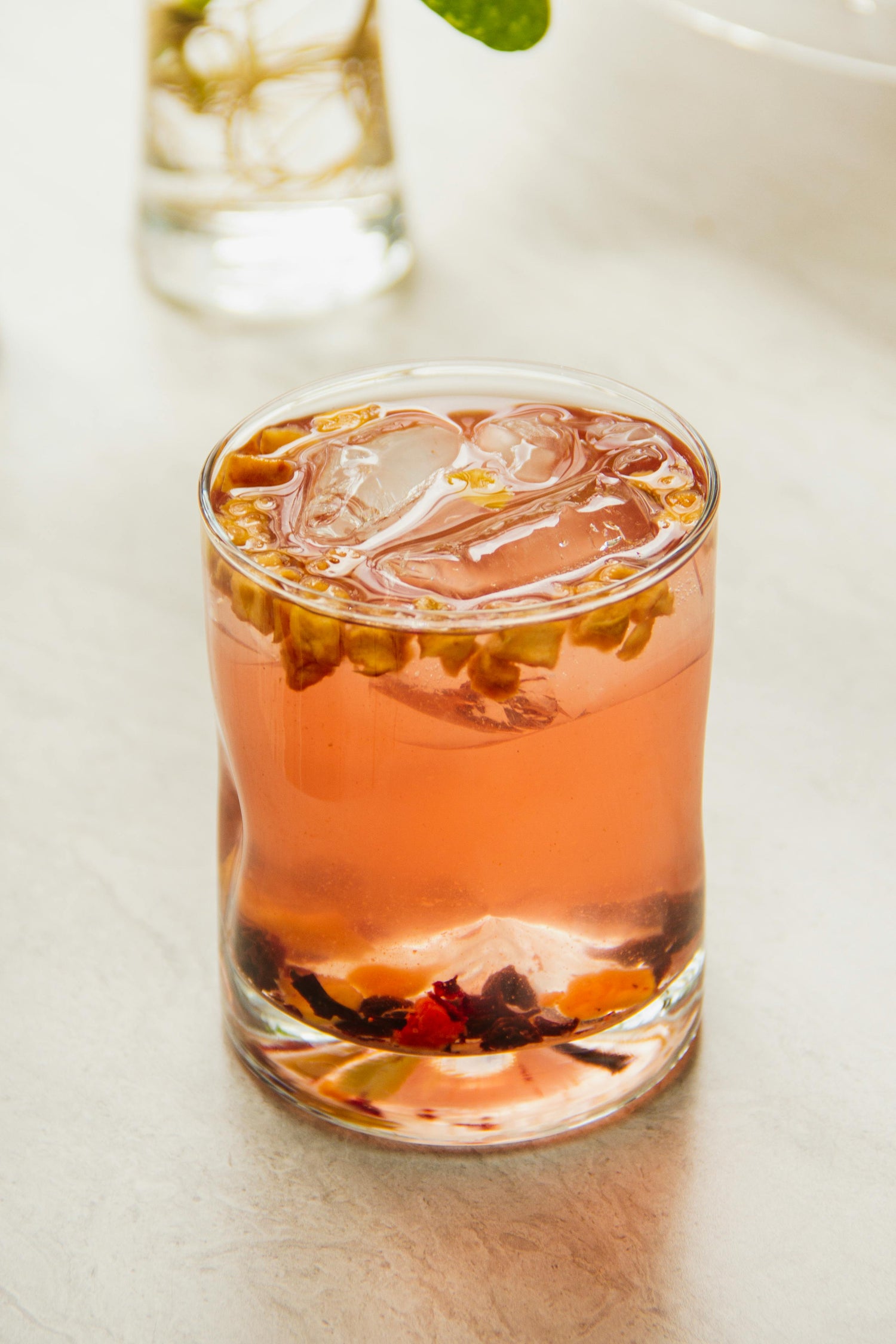 A closeup image of a tea mocktail on a table