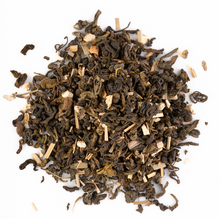 Fruity green tea with mango, pineapple, and passion fruit on a white background
